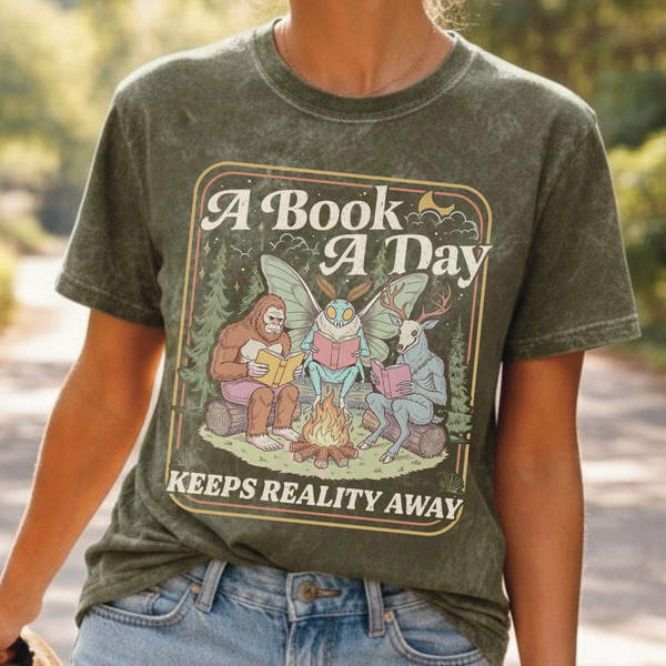 “A Book a Day Keeps Reality Away.” Cryptid Club, Wholesale Vintage Style Tee